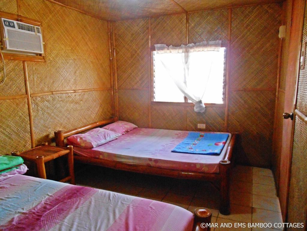 Pareja Tourist Inn لوغون الغرفة الصورة